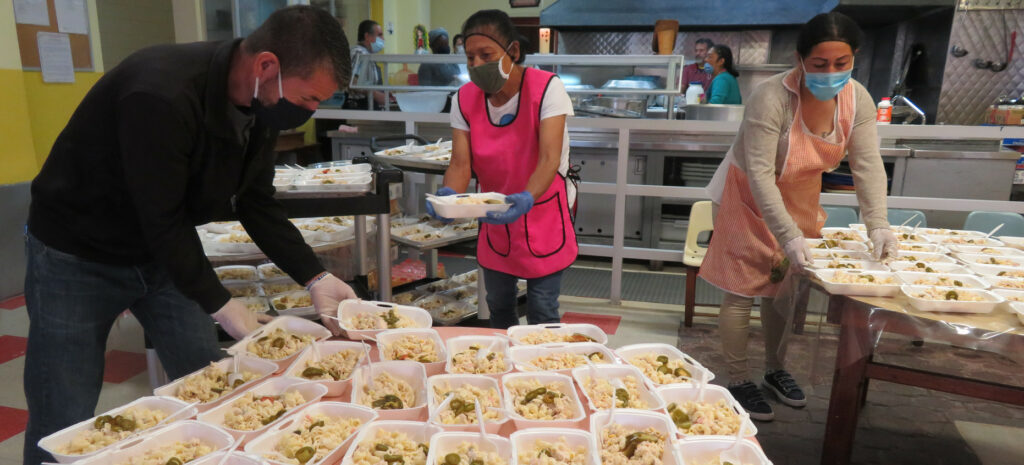 volunteers in the Casa kitchen