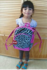 little girl with backpack